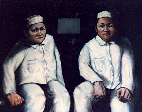 Deux hommes vêtus de costume de peintres en bâtiement, assis.